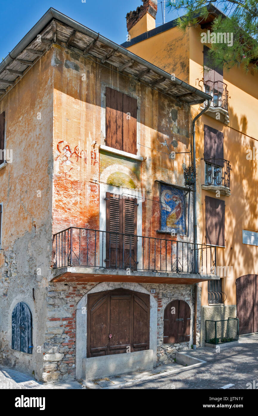 LAKE GARDA ITALY GARDONE OLD PAINTED BUILDING WITH A MURAL Stock Photo