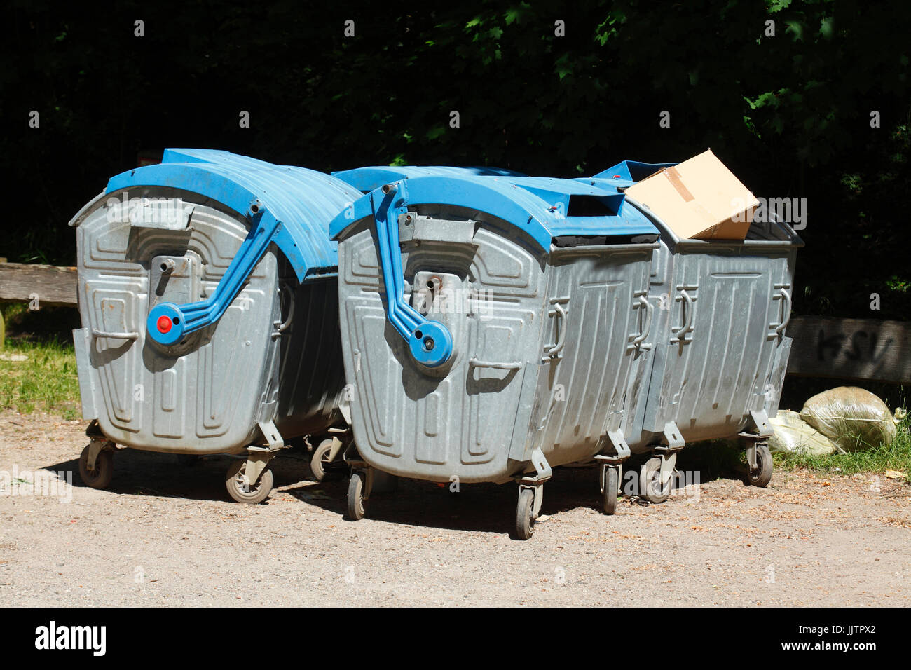 blue metal reciyling bins for waste paper Stock Photo