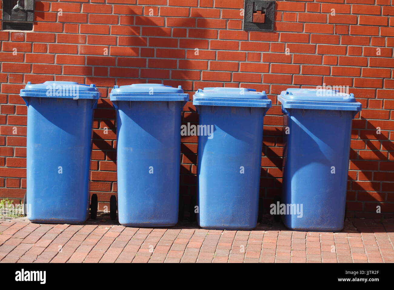blue plastic reciyling bins for waste paper Stock Photo