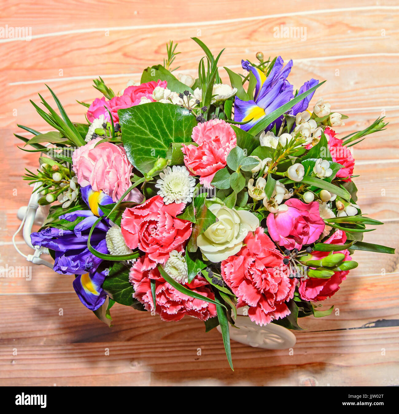 image background colorful multicolored small artificial flowers in a basket  Stock Photo - Alamy
