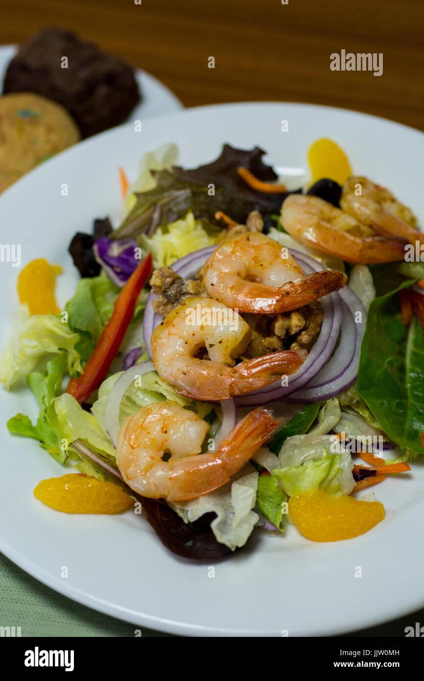 Lunch, Mandarin orange shrimp salad with candied walnuts. Stock Photo