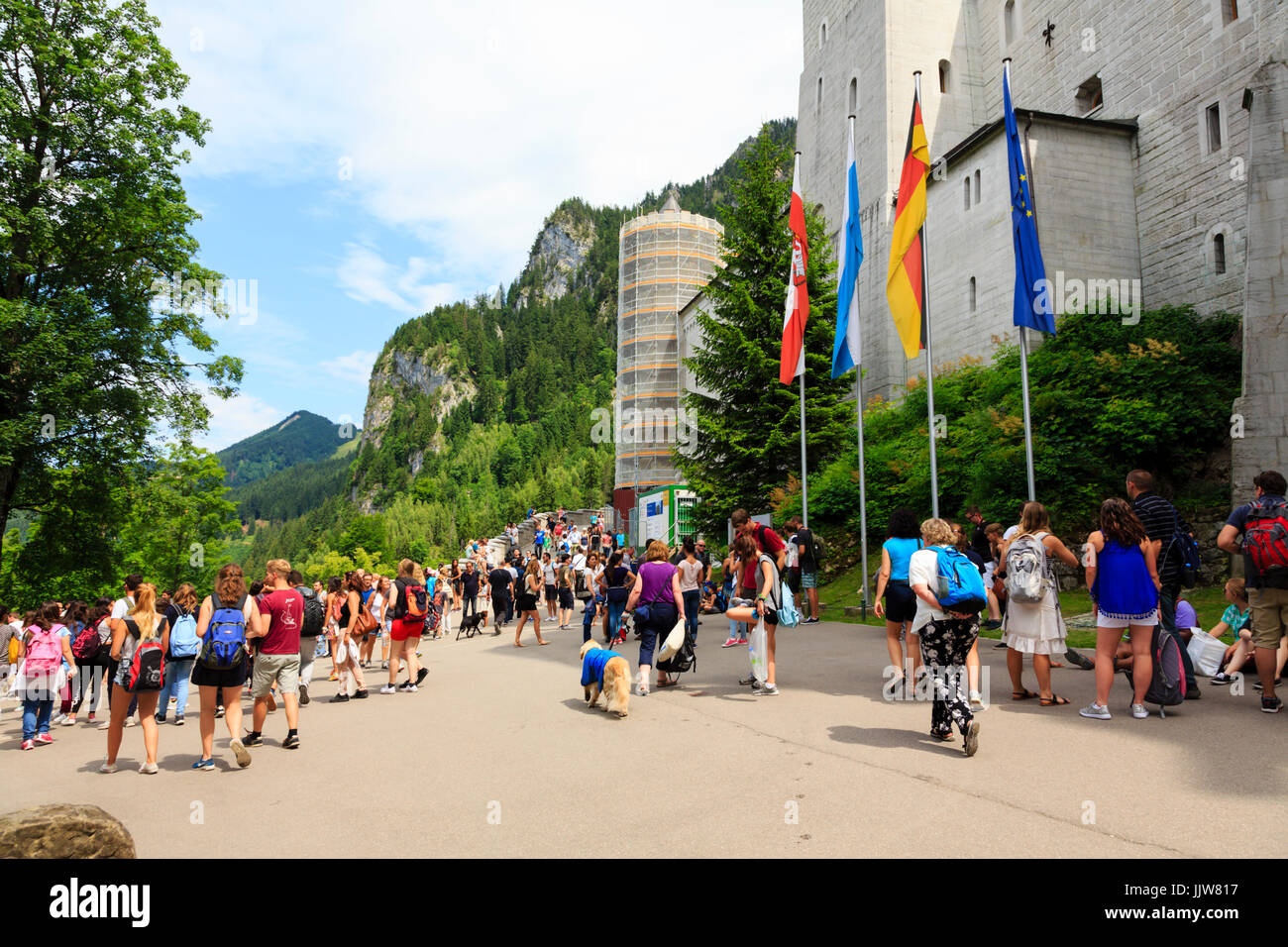 Tourists gather at the entrance to Schloss Neuschwanstein, Munich, Bavaria, Germany Stock Photo