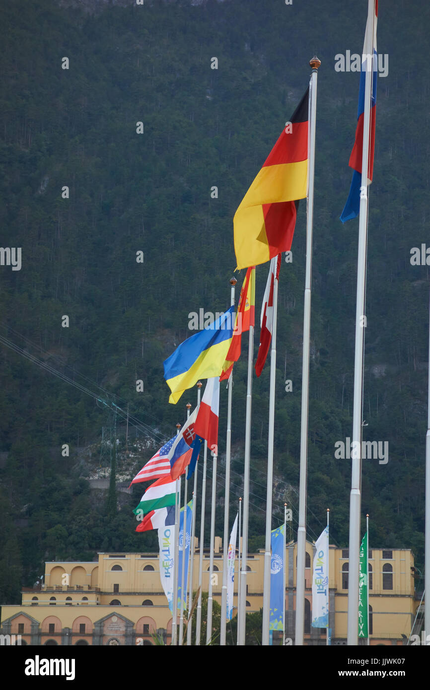 Flags flying on quayside. Riva del Garda. Lake Garda. Italy Stock Photo