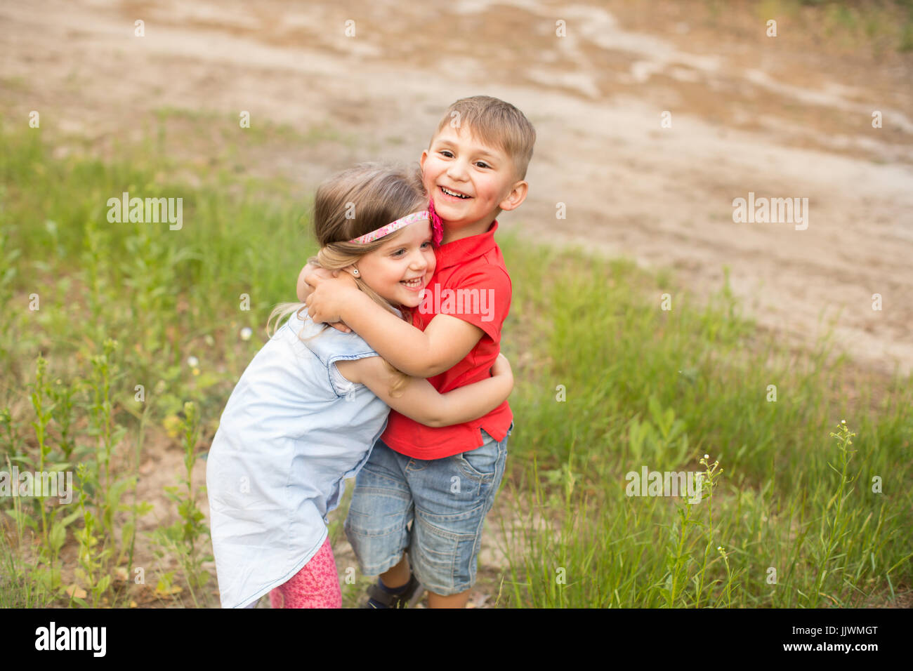 Funny children in the summer park Stock Photo