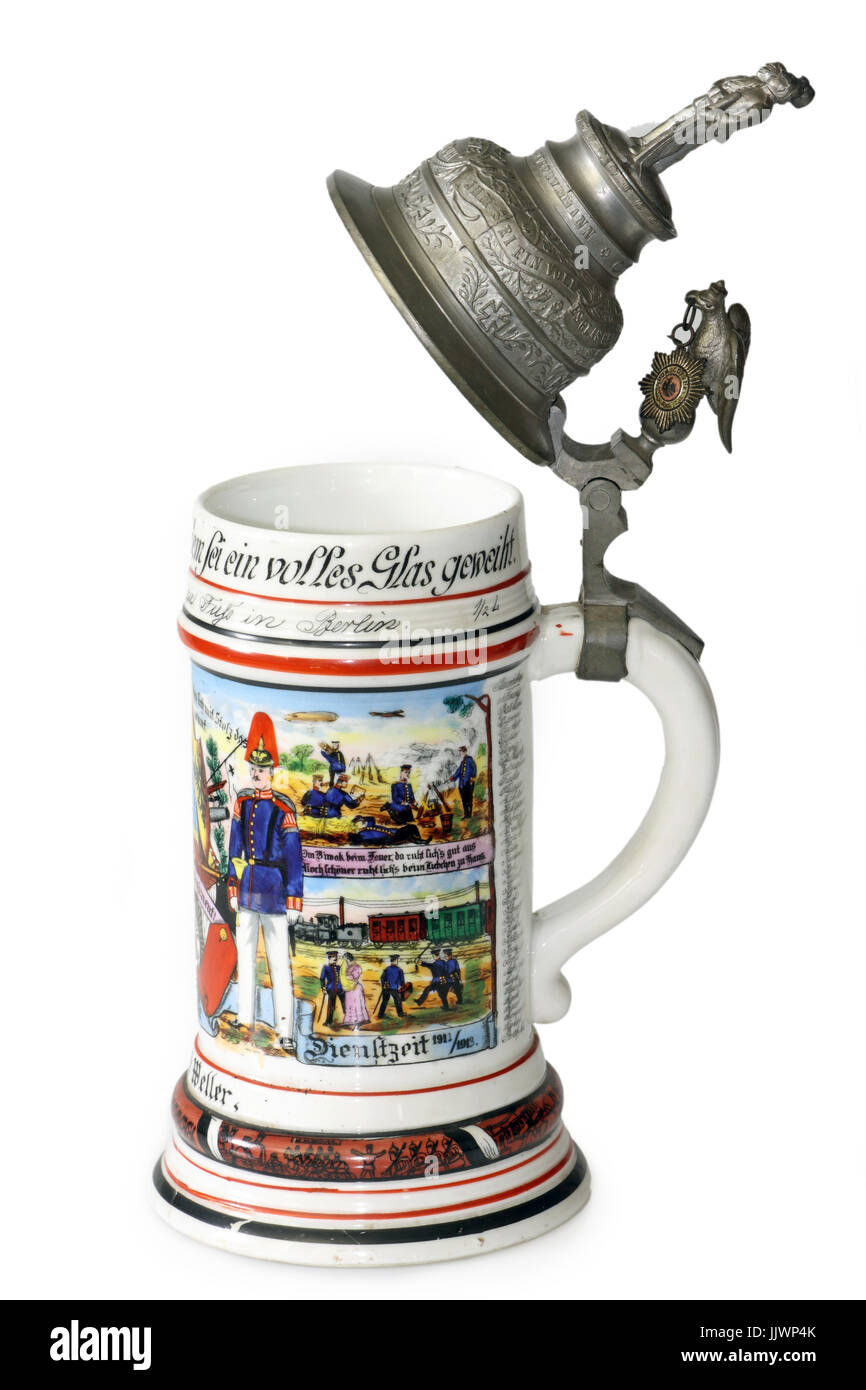 A traditional German military beer jug the with silver lid isolated on
