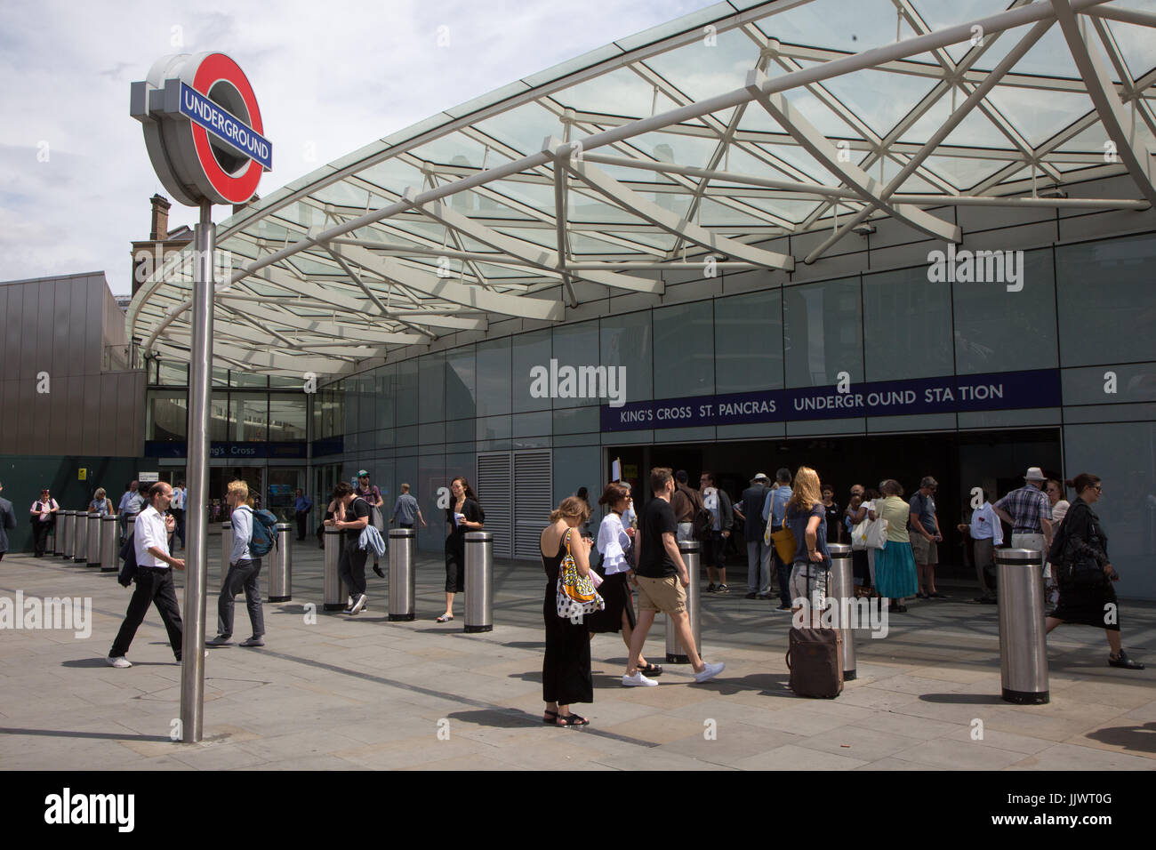 Exterior of King's Cross Underground Station - one of the entrances featuring a large roundel logo Stock Photo