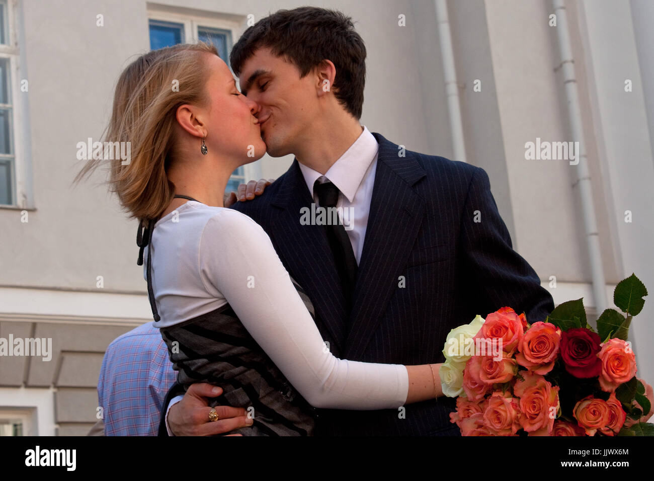 A couple celebrating graduation Stock Photo - Alamy