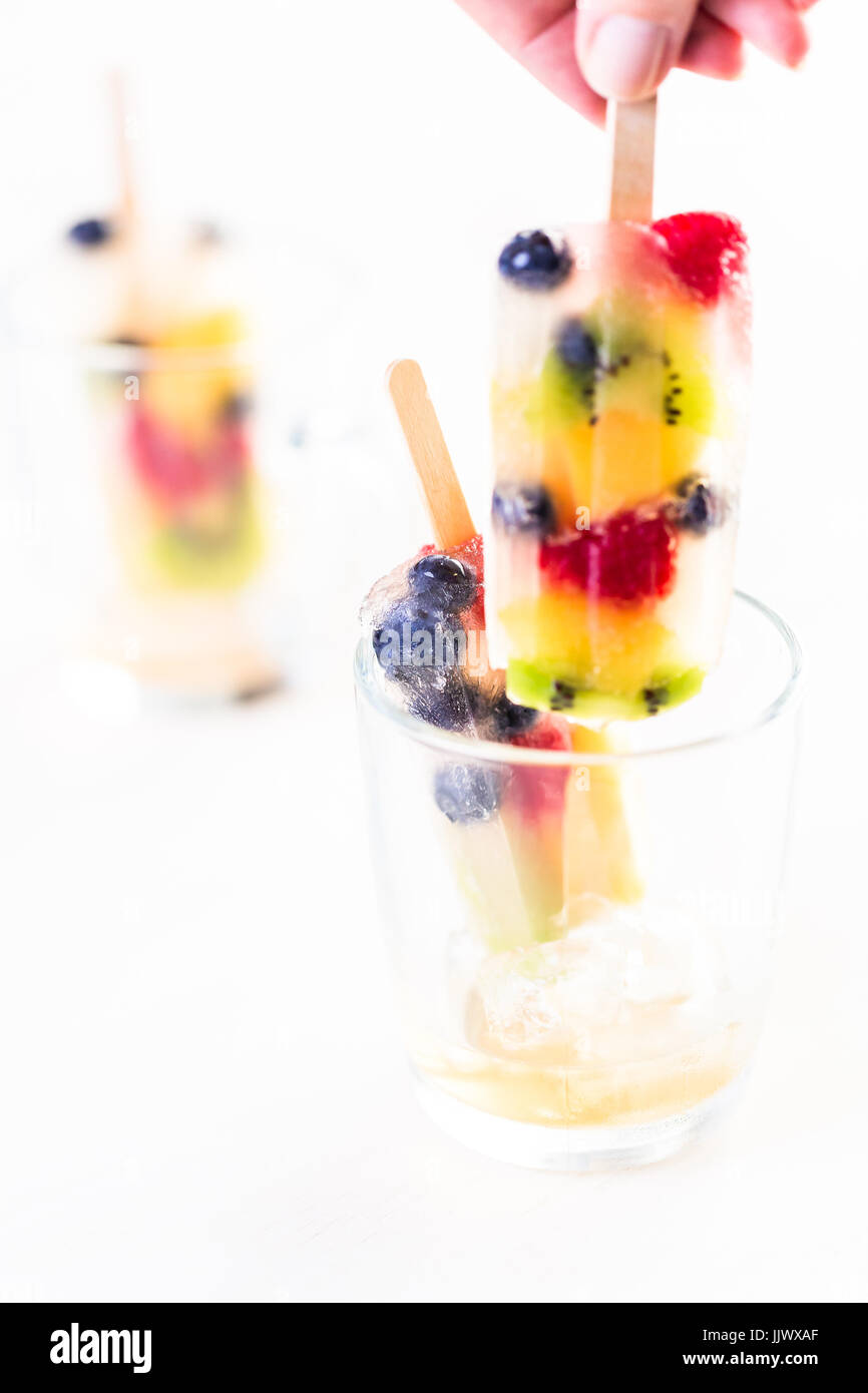 Homemade fresh fruit popsicles with apple juice Stock Photo Alamy