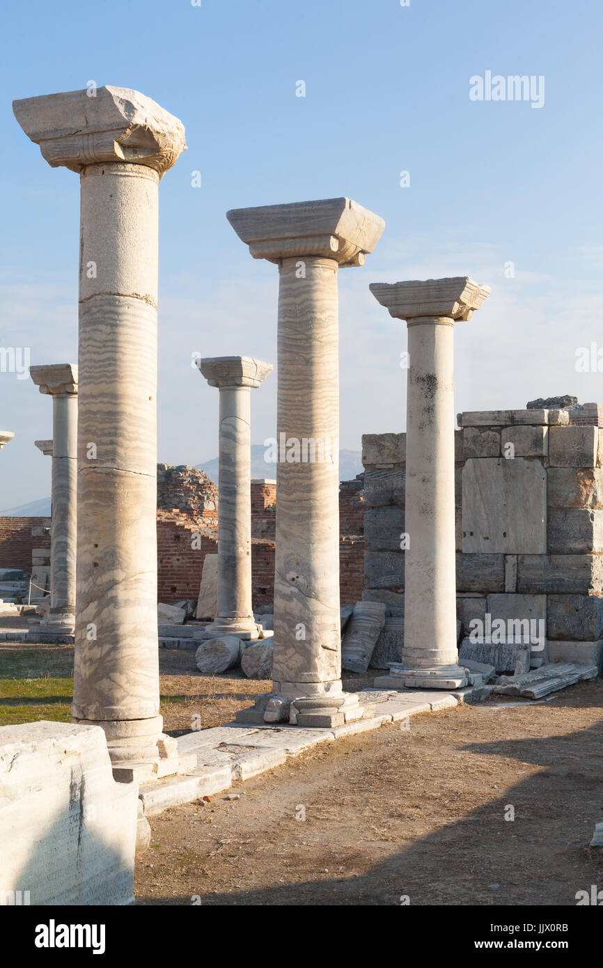 Roman stone pillars and statue and altar ruins room in ephesus Archaeological site in turkey Stock Photo
