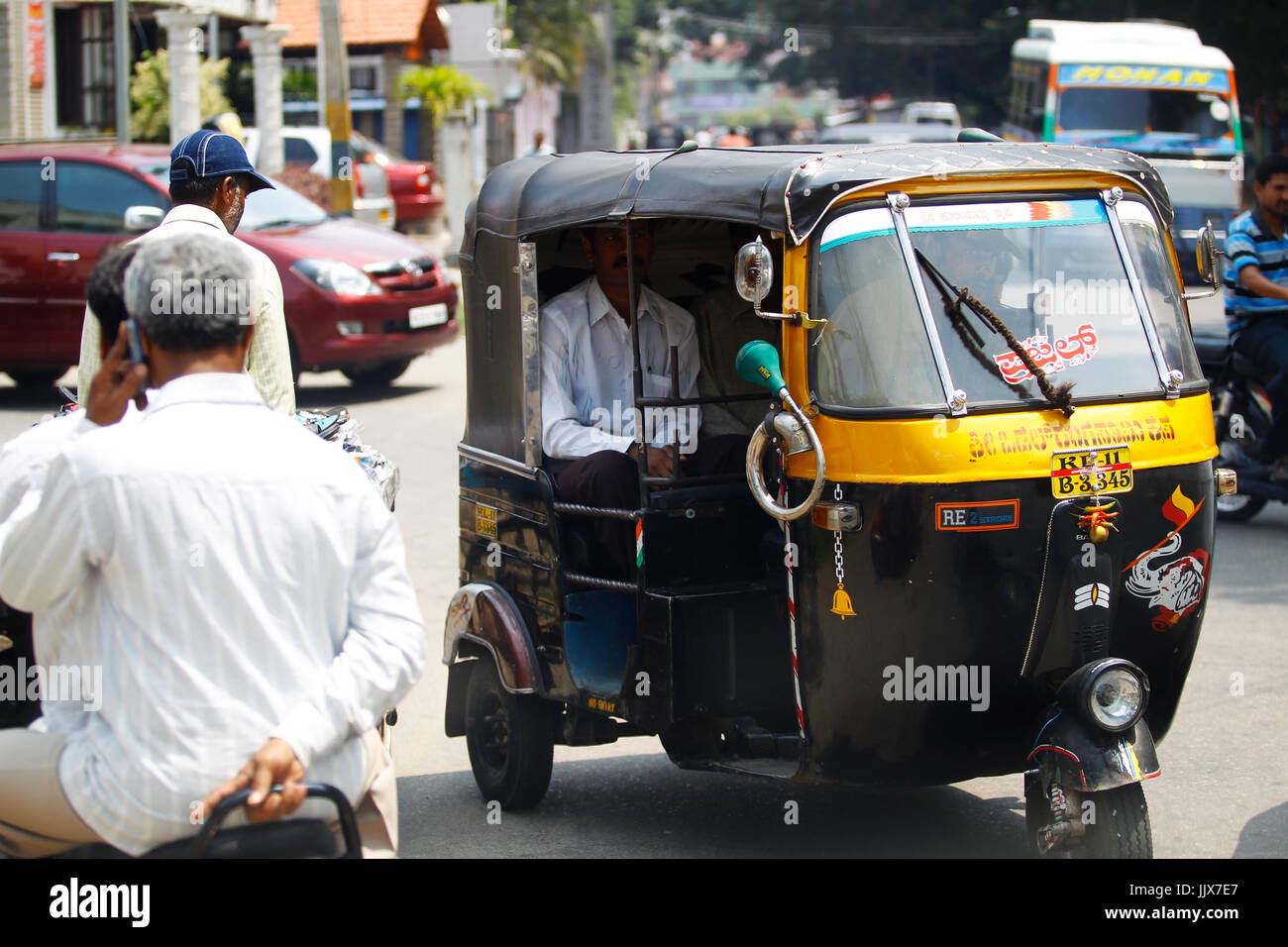 Tuk Tuk taxis are a commom public transport in the Indian streets, Mysore, Karnataka, India Stock Photo