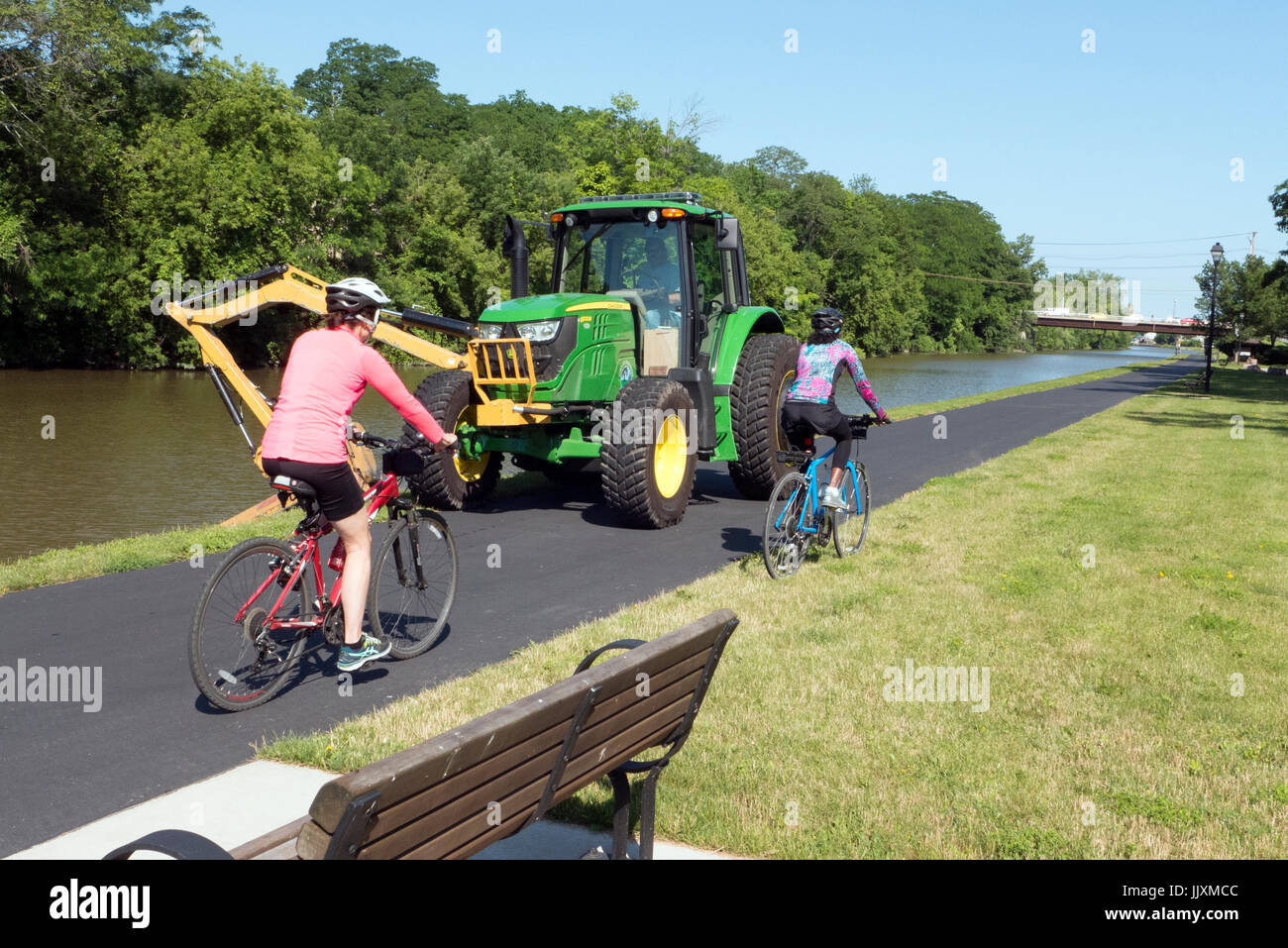 Erie Canal bike path and lawn mower Stock Photo Alamy