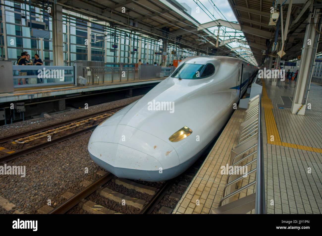 KYOTO, JAPAN - JULY 05, 2017: JR700 shinkansen bullet train departing Kyoto station in Kyoto, Japan. Stock Photo