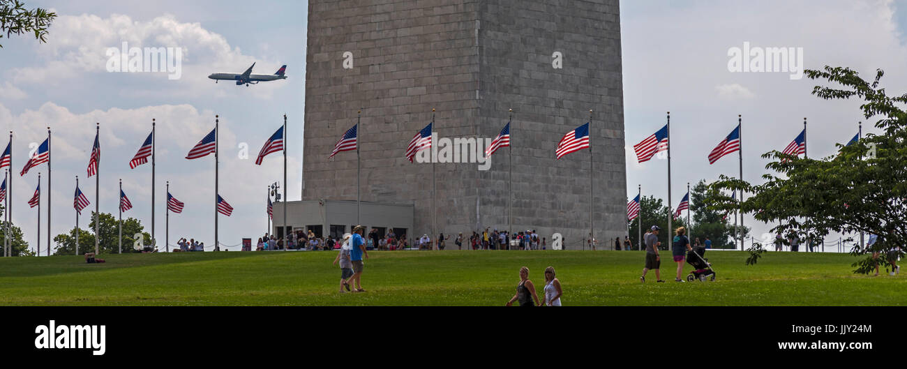 Washington, DC - The Washington Monument, with a Delta Airlines plane approaching nearby Reagan National Airport. Stock Photo