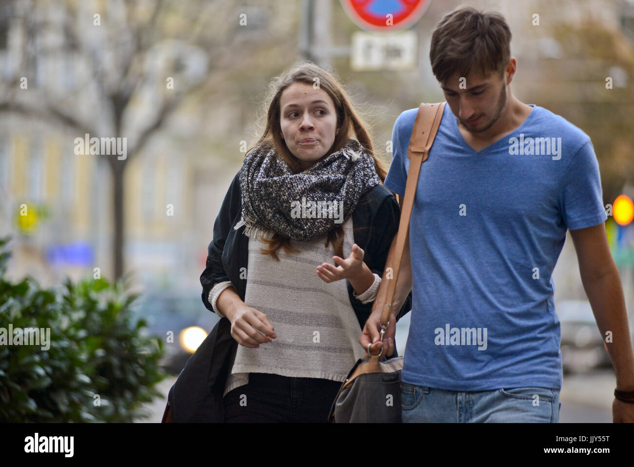 A couple arguing in the street Stock Photo