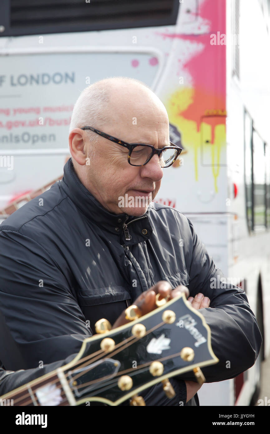 London, UK. 21st July, 2017. Dire Straits frontman Mark Knopfler unveils  two iconic London buses to celebrate launch of Gigs, in association with  Gibson, on the eve of International Busking Day in