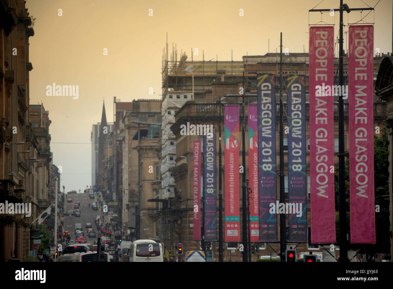 People Make Glasgow Glasgow 2018 banners George square heavy traffic smog exhaust fume aura Stock Photo