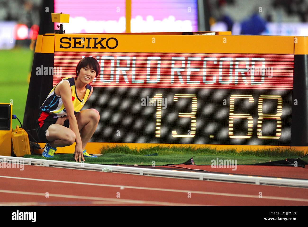 World record time 100m display hi-res stock photography and images - Alamy