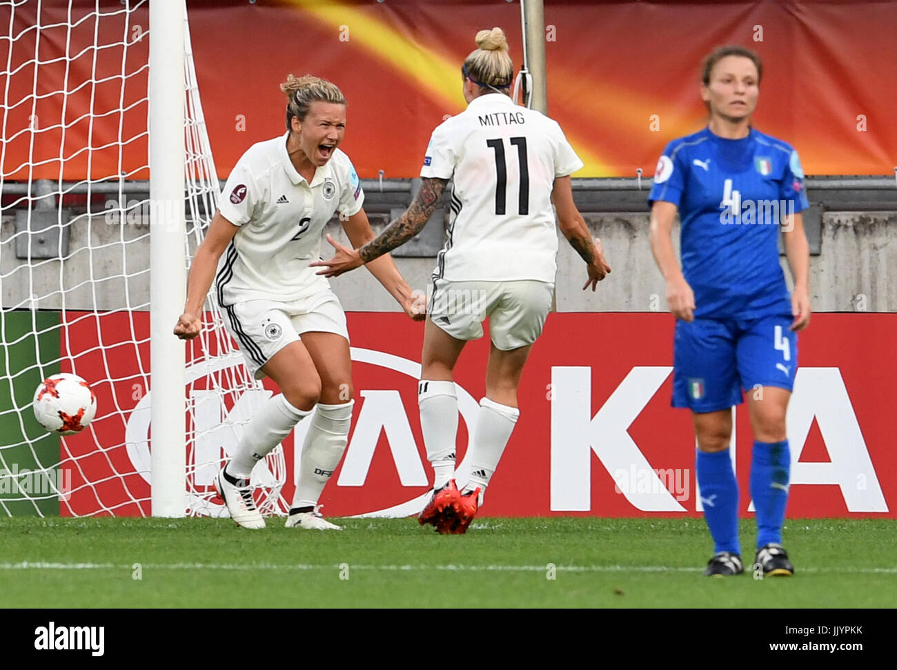 Germany's Josephine Henning (R) cheers over her 10 score with Anja