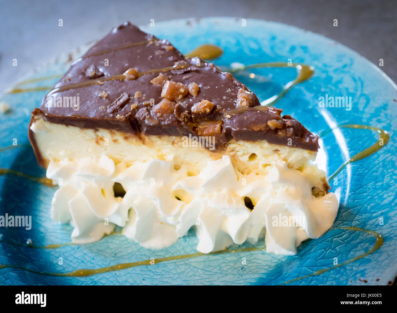 A decadent slice of s'mores cheescake from D'Lish by Tish Cafe in Saskatoon, Saskatchewan, Canada. Stock Photo