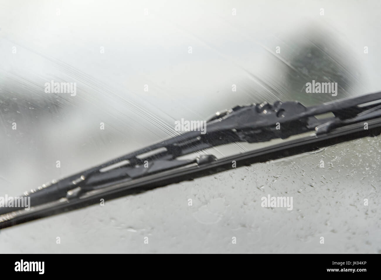windscreen wiper detail in rainy ambiance Stock Photo
