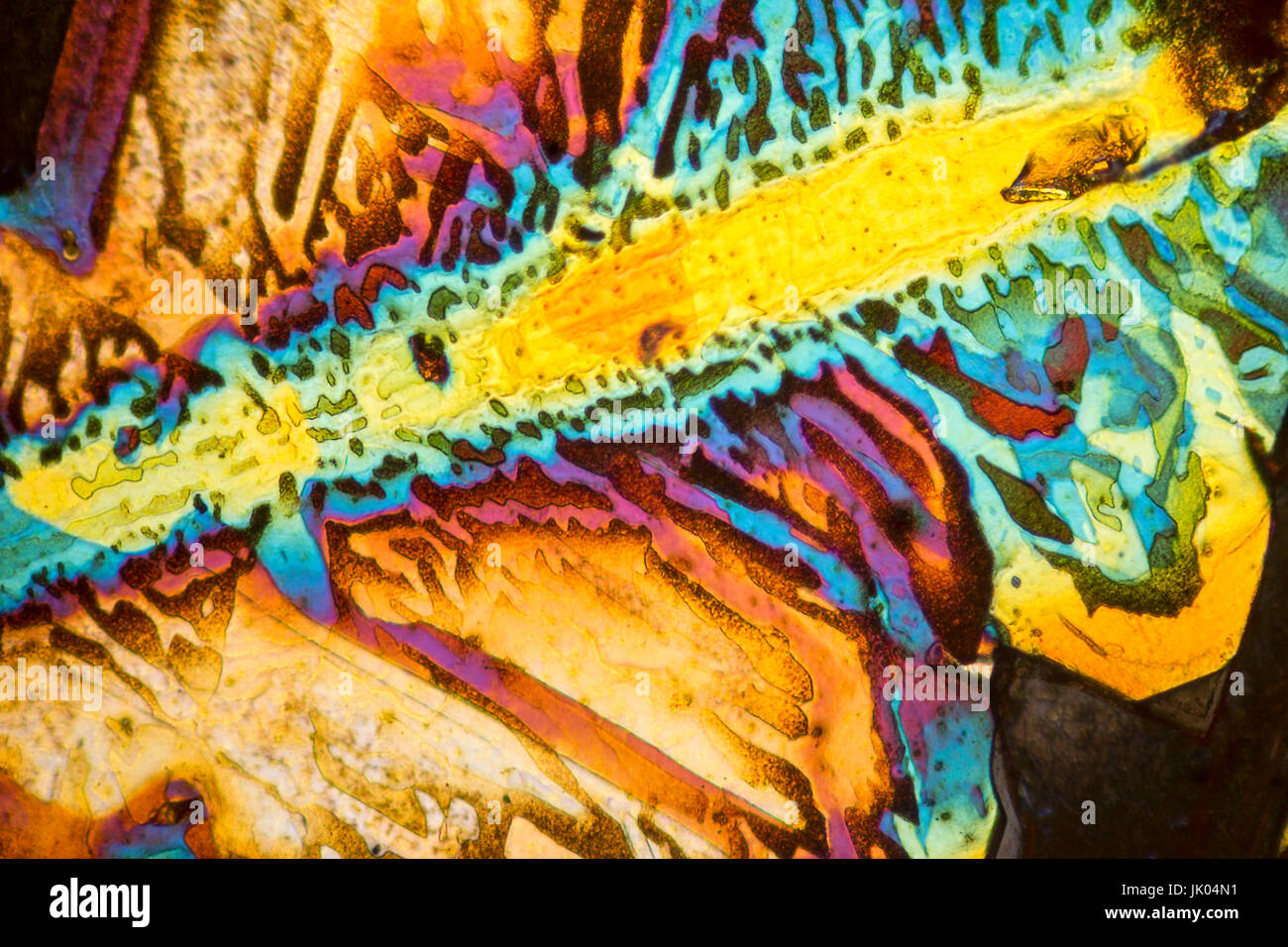colorful microscopic shot of salt acid microcrystals in polarized light Stock Photo