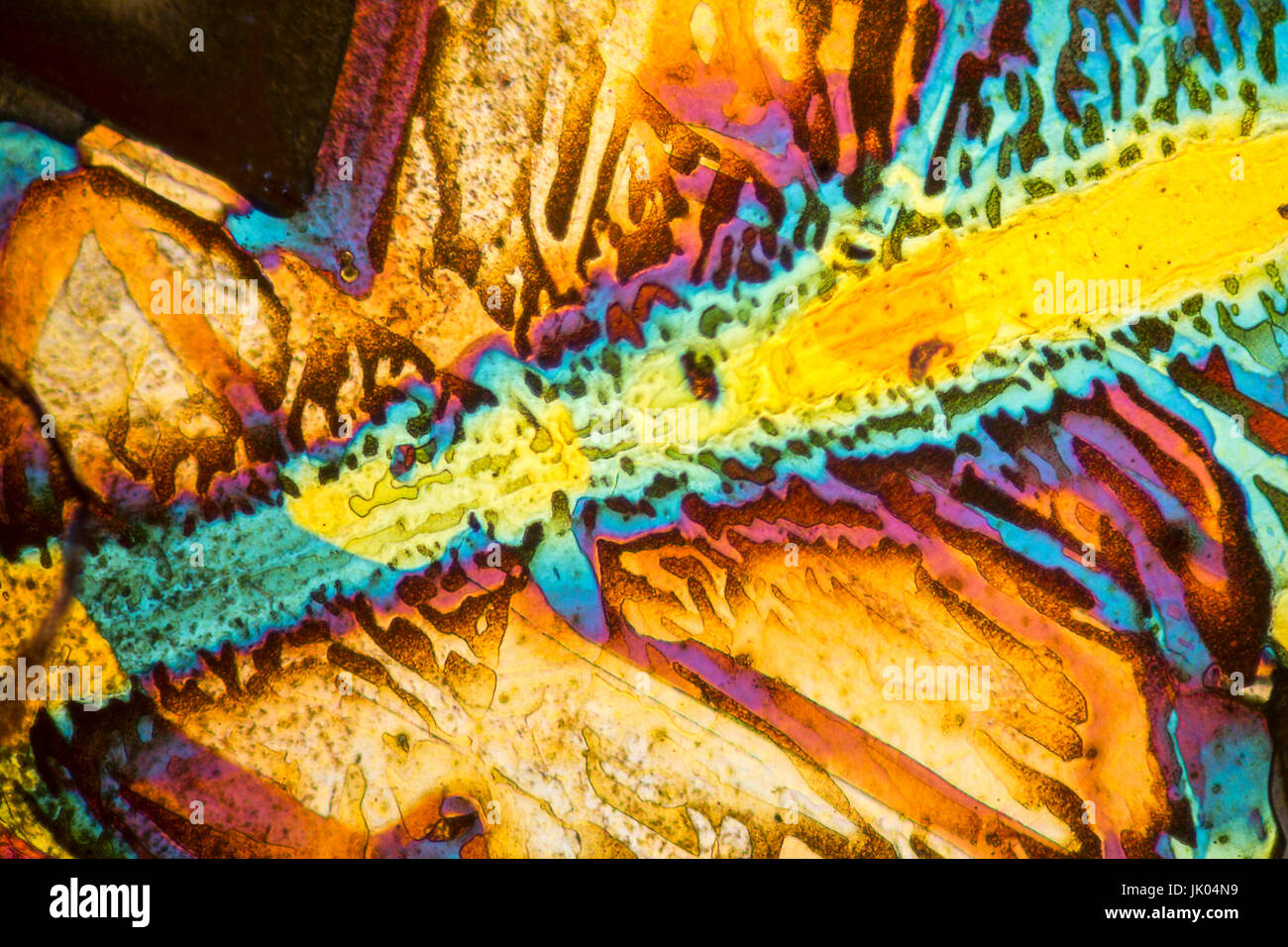 colorful microscopic shot of salt acid microcrystals in polarized light Stock Photo