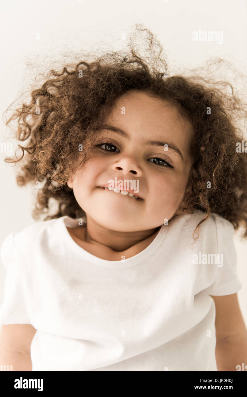 Cute Curly African American Baby Girl Close Up Portrait Stock