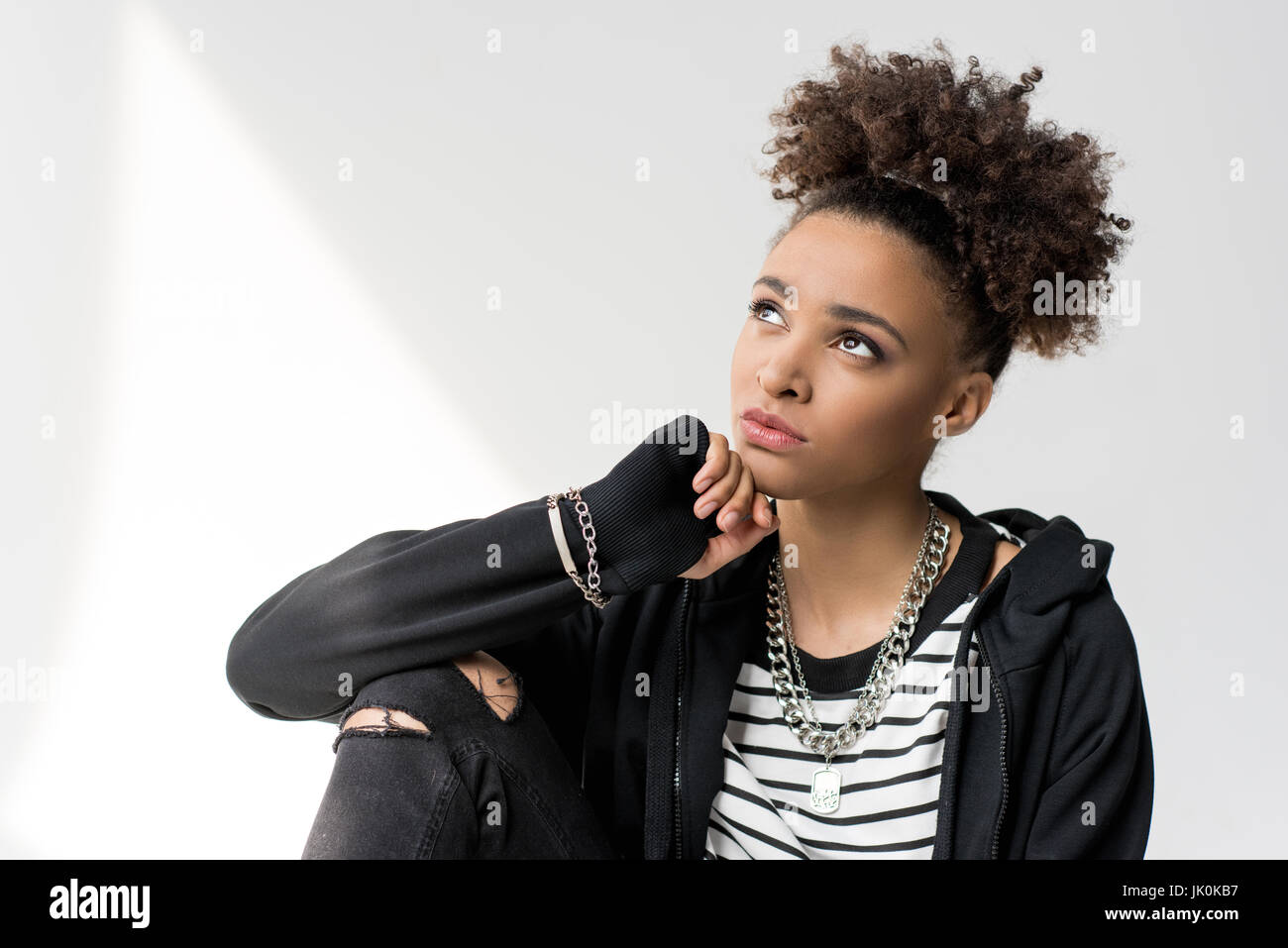 portrait of young pensive african american girl looking up Stock Photo ...