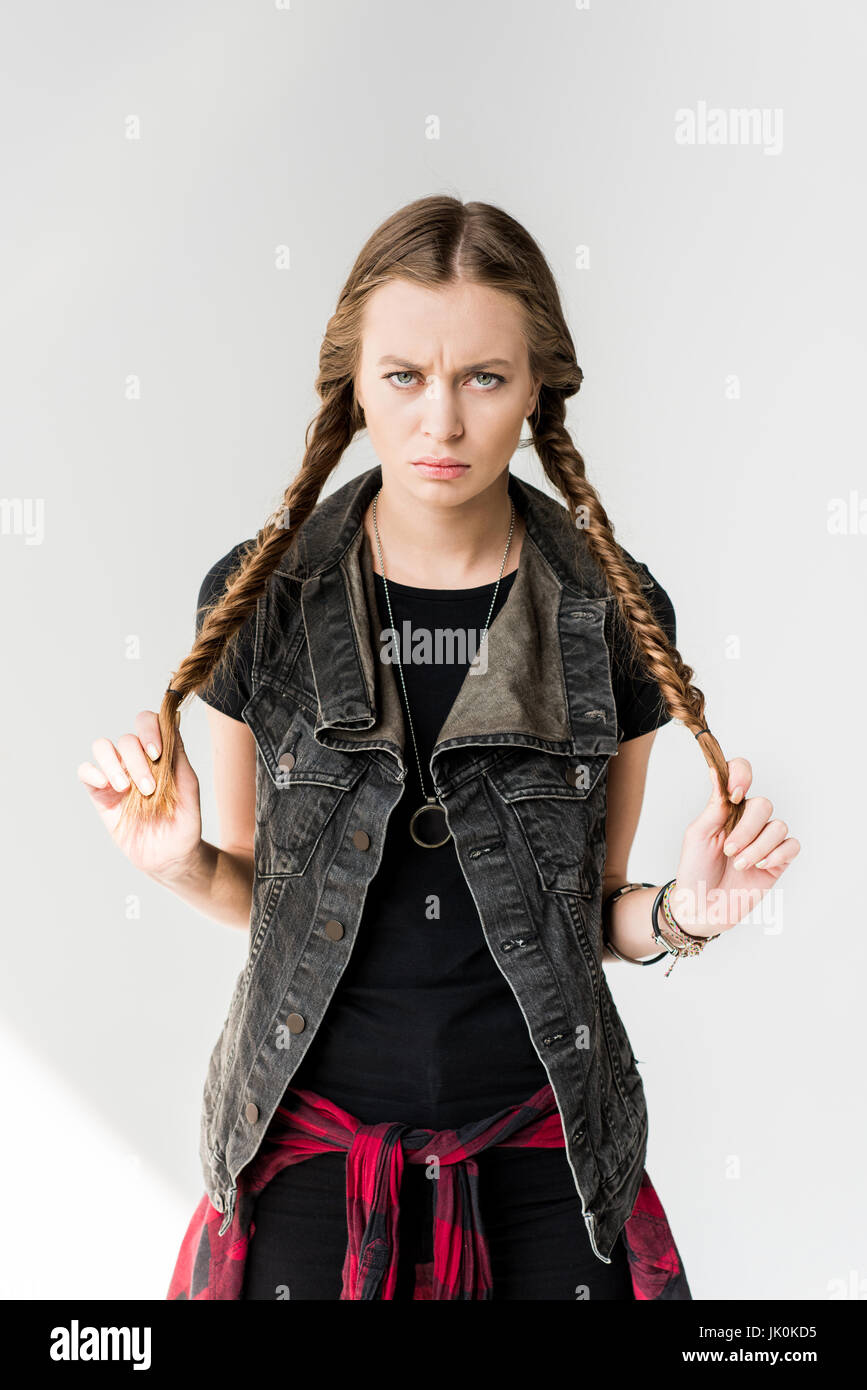 Portrait Of Attractive Blonde Rocker Girl With Braids Posing And