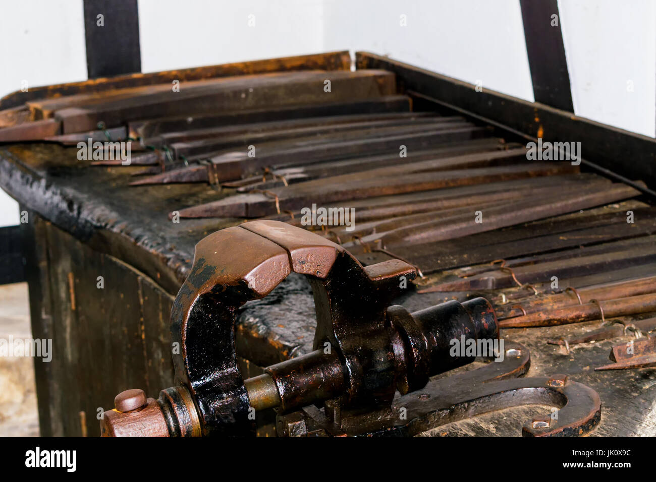 Old workbench with various tools and machines Stock Photo - Alamy