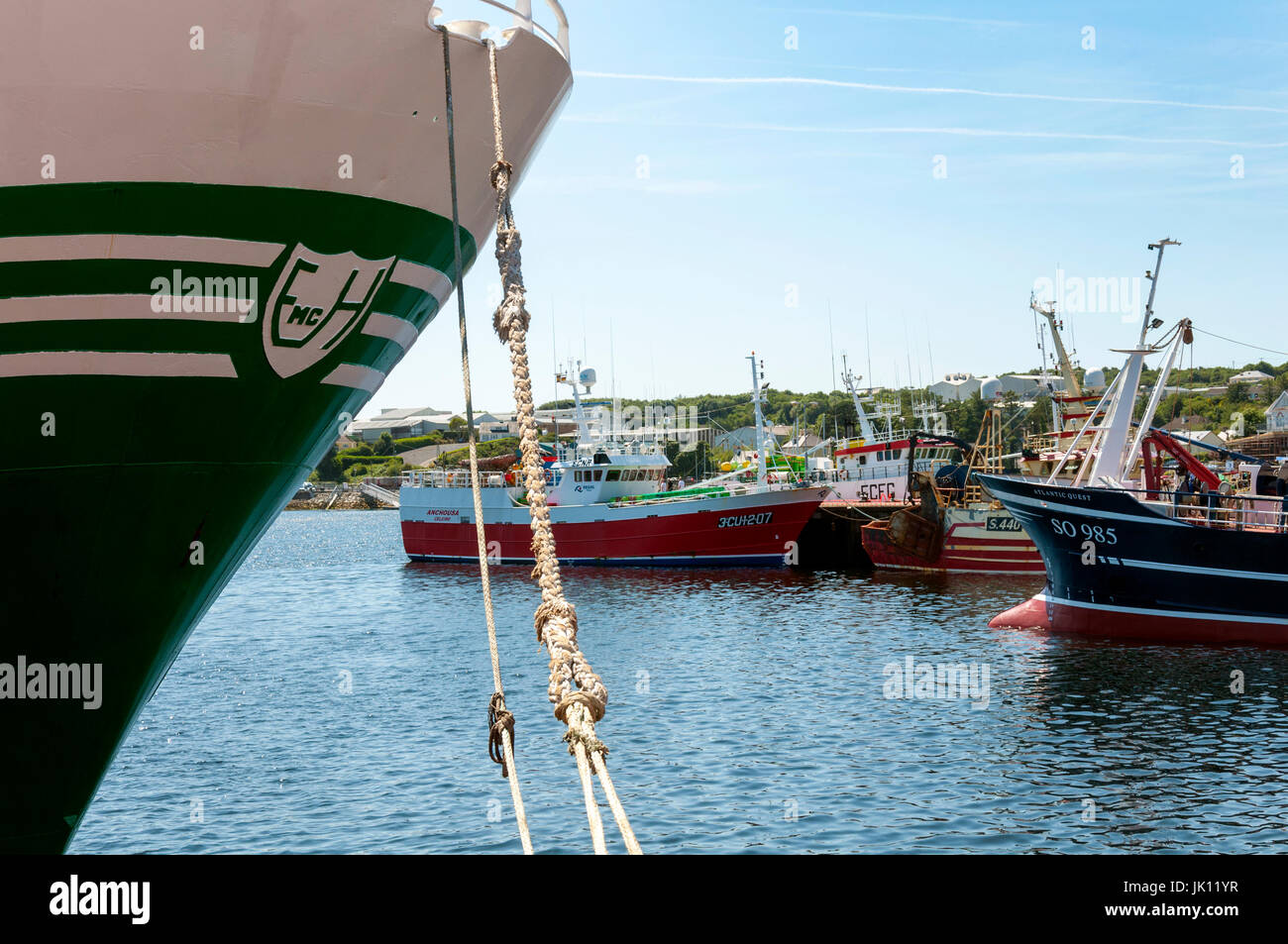 Moored fishing boats vessels trawlers in Killybegs harbour, County Donegal, Ireland Stock Photo