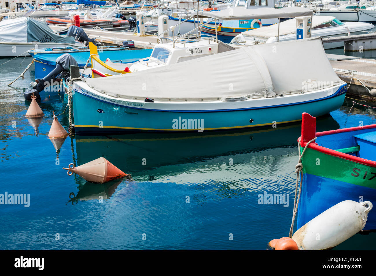 Boats at a port on a sunny day in Malta Stock Photo