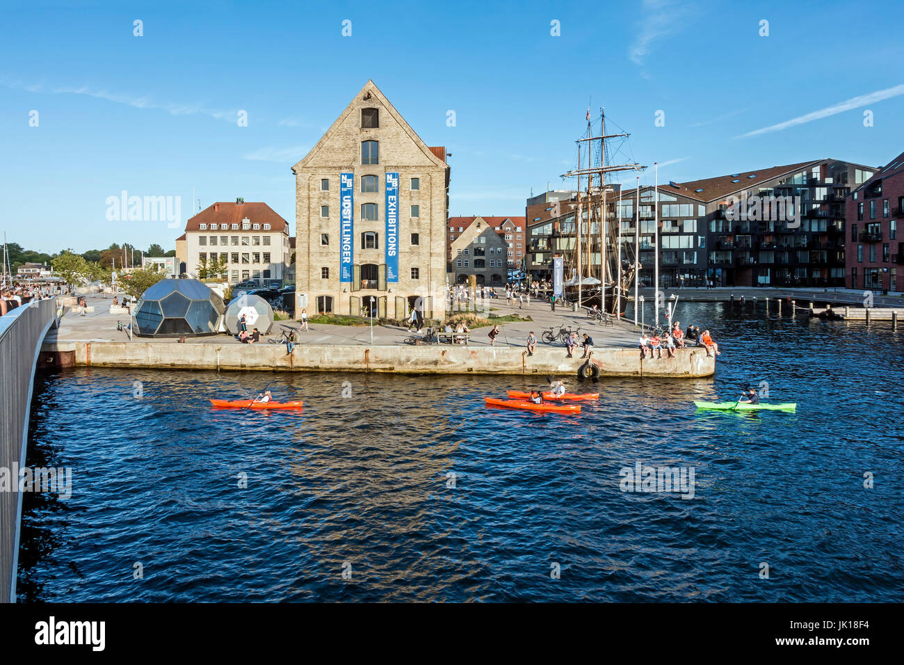 Evening light on North Atlantic House in Christianshavn Copenhagen Denmark Europe as seen from Innerhavnsbroen (left) Stock Photo