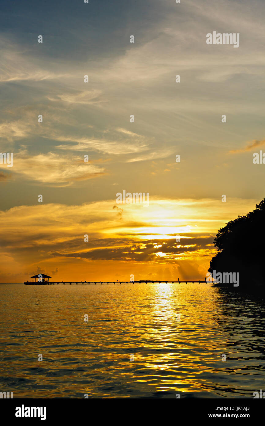 Beautiful tropical sunset on the beach Stock Photo - Alamy