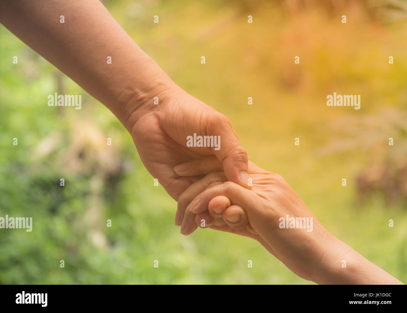 Two pairs of hand touch together, helping hands concept. Helping hand outstretched for help. Stock Photo