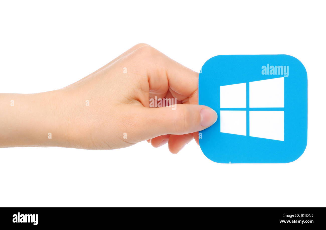 Kiev, Ukraine - May 18, 2016: Hand holds Microsoft Windows icon printed on paper Stock Photo