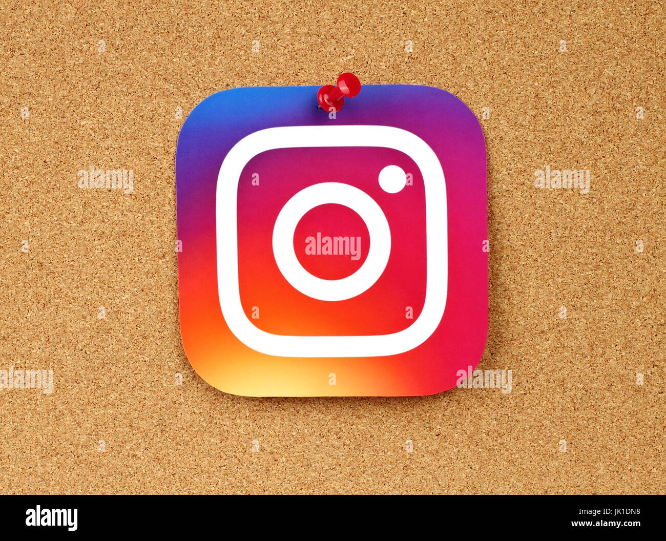 Kiev, Ukraine - January 24, 2017: Instagram logo printed on paper and pinned on cork background. Instagram is an online mobile photo-sharing, video-sh Stock Photo