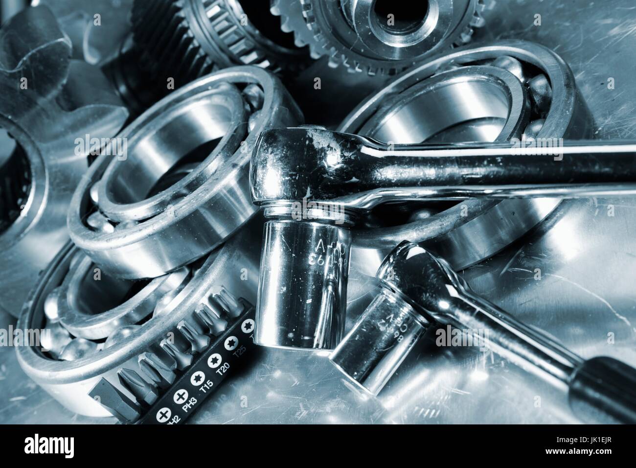 Spanners and wrenches with gears and ball-bearings,slight blue toning. Stock Photo