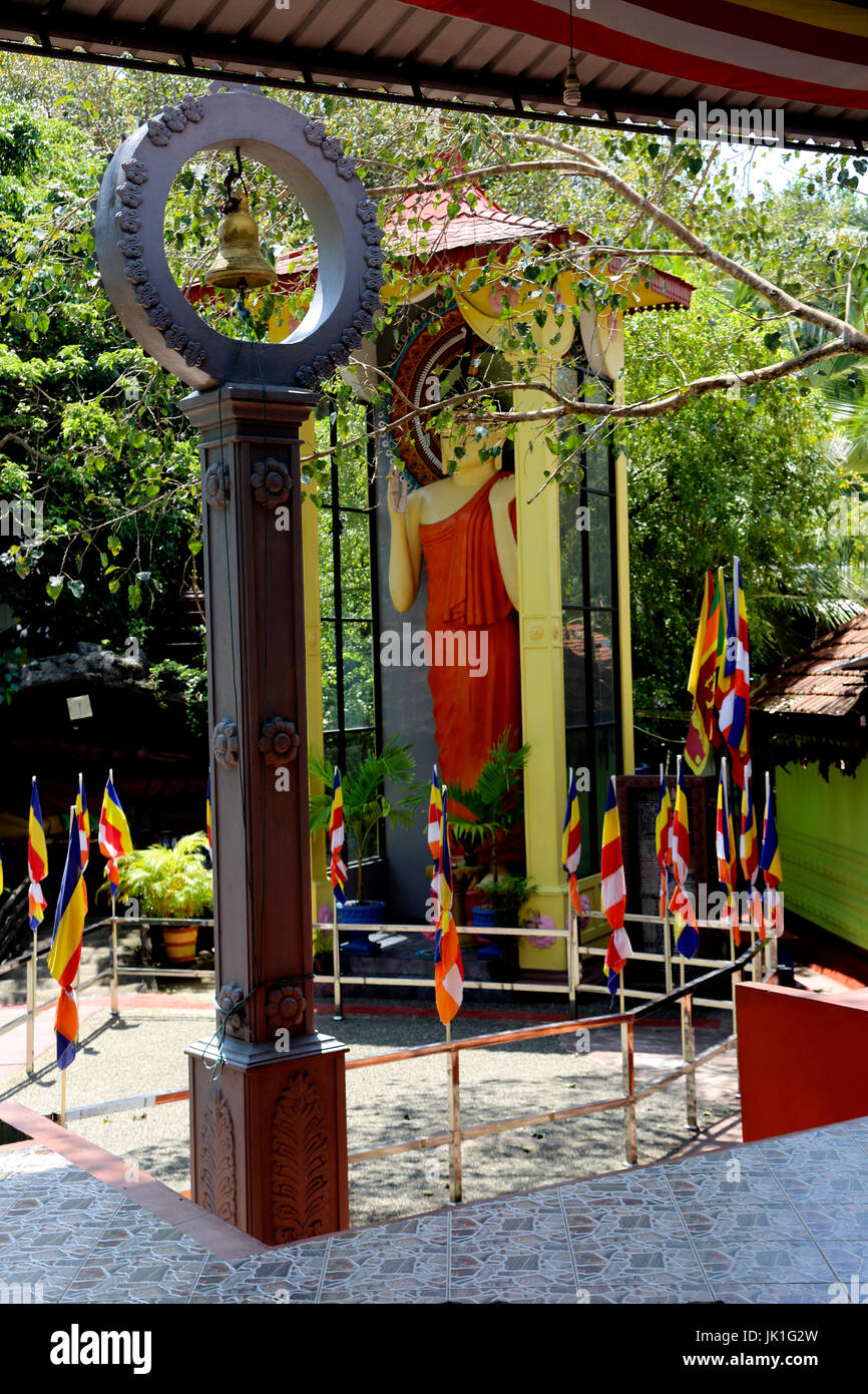 Galle Sri Lanka Rumassala Road Sri Vivekaramaya Temple Bell And Standing Buddha Stock Photo
