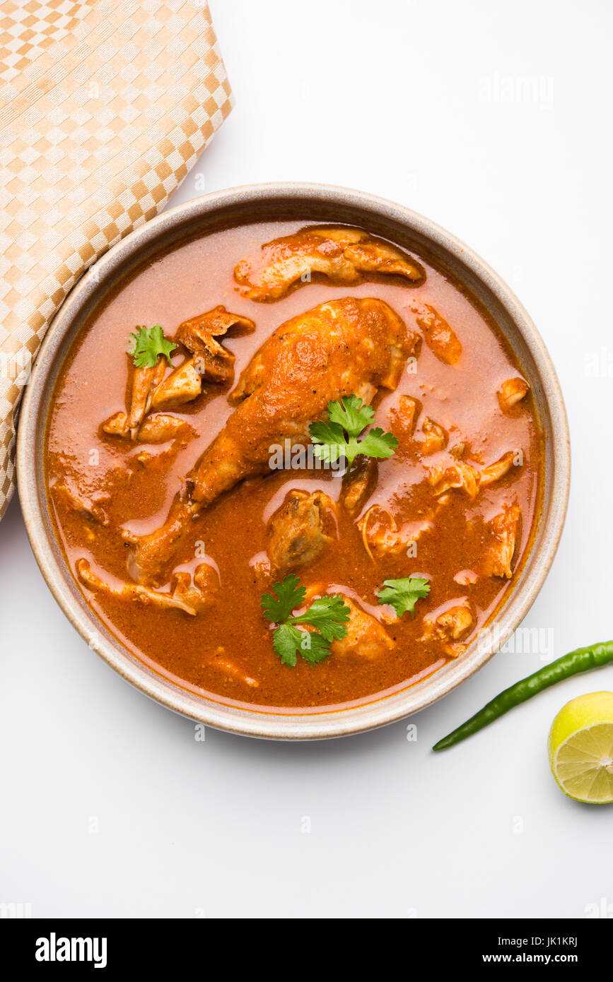 Indian spicy Chicken curry or masala chicken with prominent leg piece