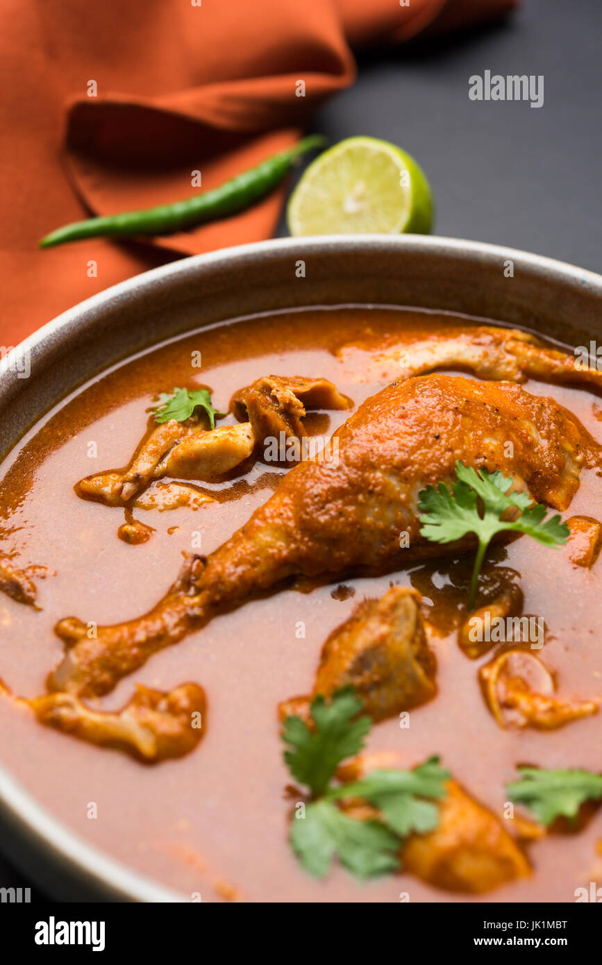 Indian spicy Chicken curry or masala chicken with prominent leg piece