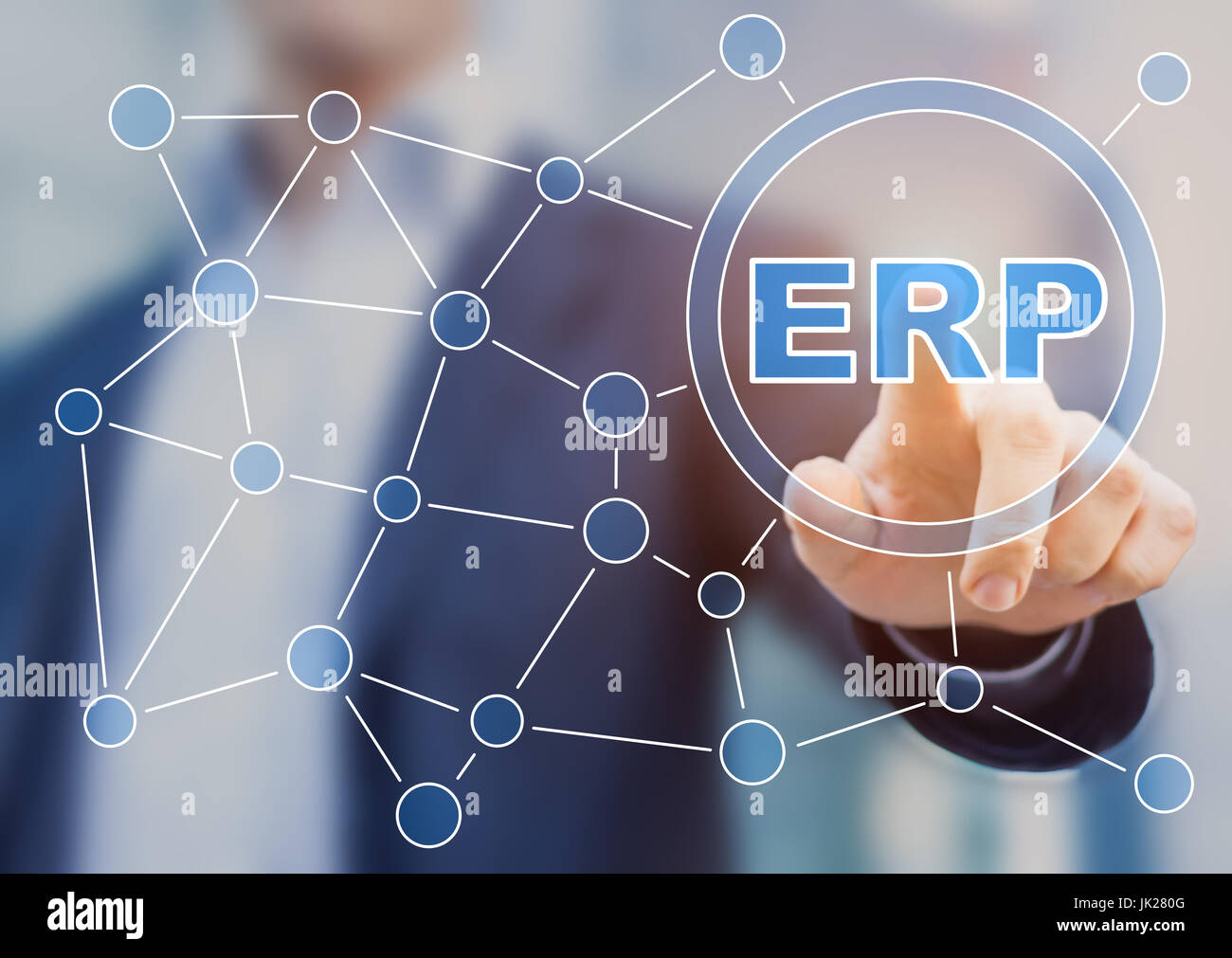 Manager touching Enterprise Resource Planing (ERP) button on a digital screen interface with connections symbolizing connected integrated services (pr Stock Photo