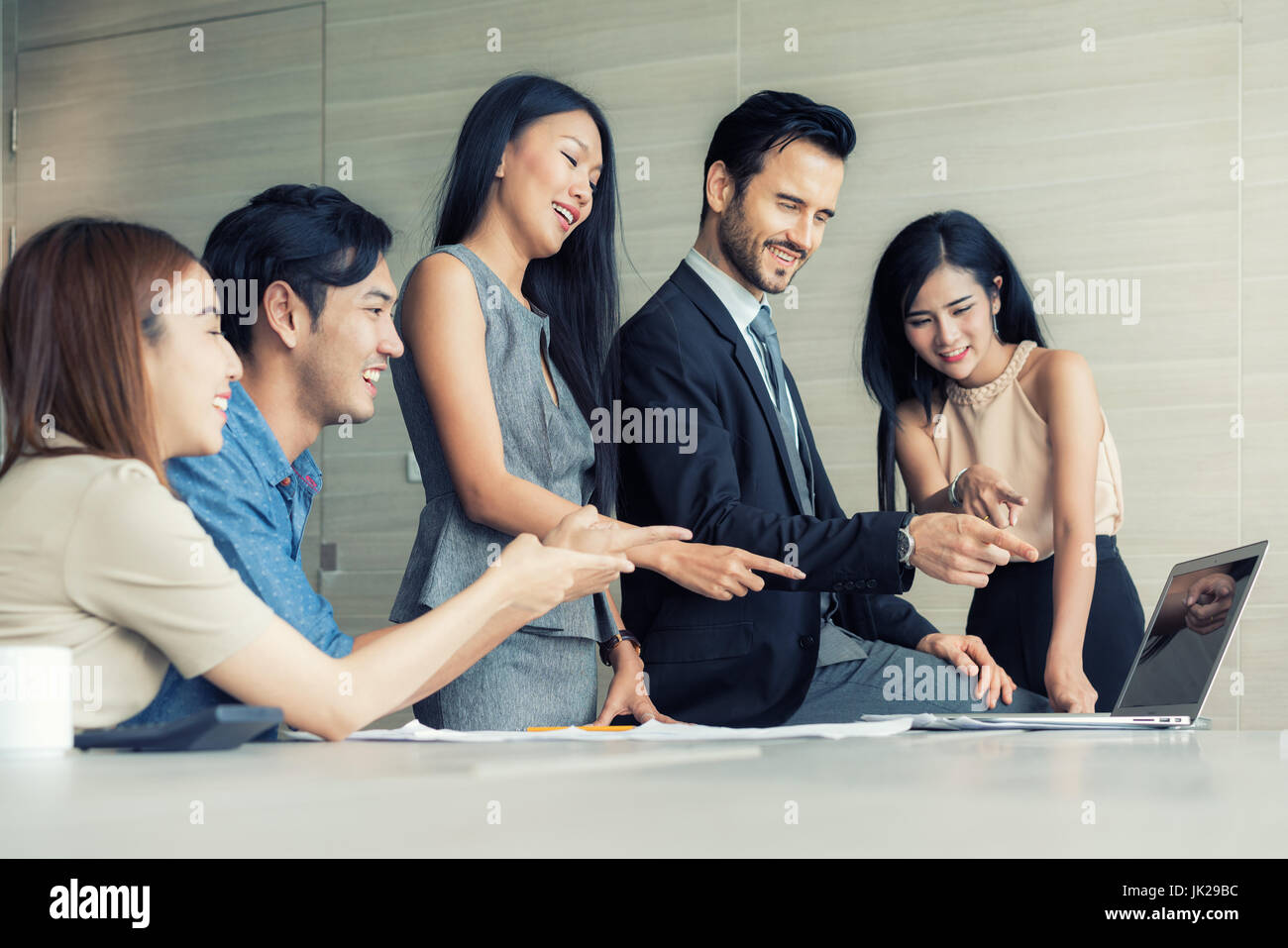 Group of multi-ethnic business partners creative project during work process. Business meeting discussion startup concept office. Stock Photo