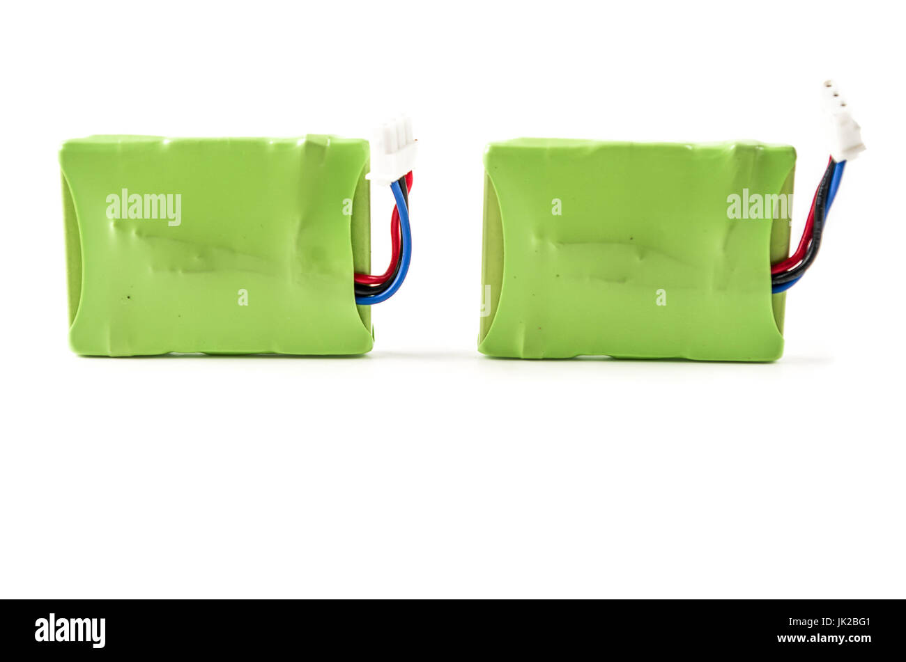 Battery covered with a green plastic isolated on white background Stock