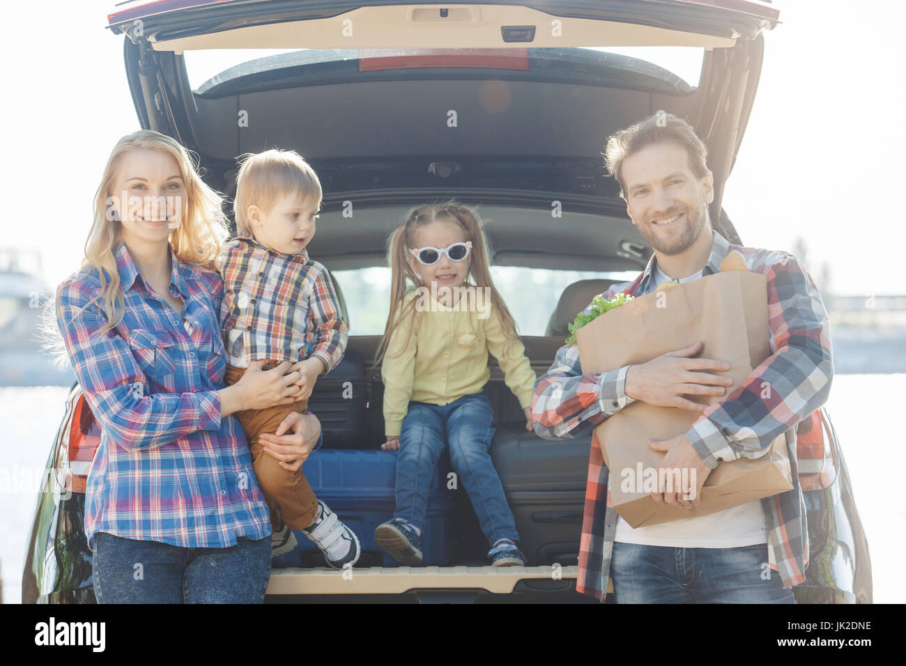Travel by car family together destination arrival Stock Photo - Alamy