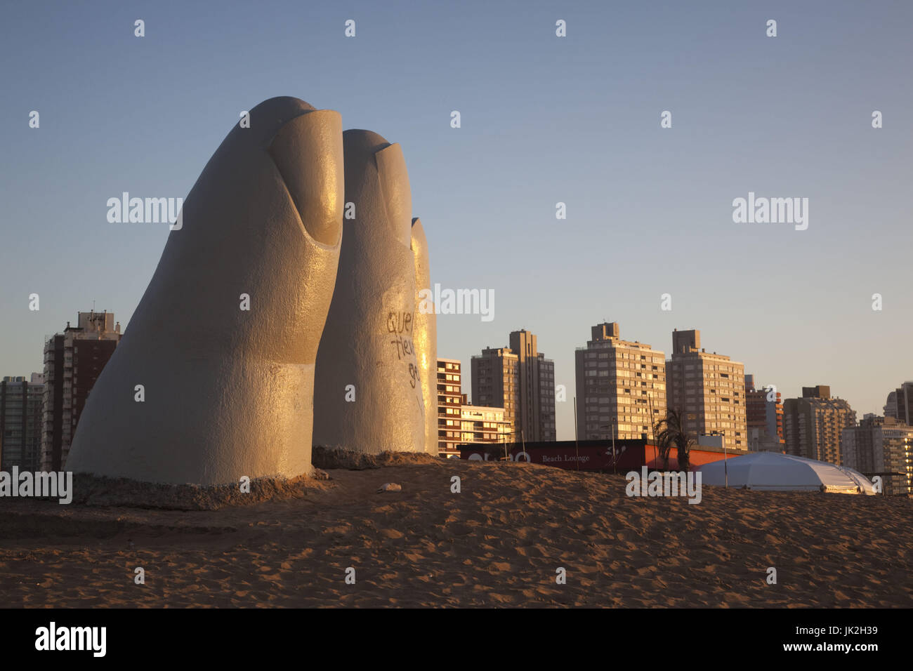 Uruguay, Punta del Este, Playa Brava beach, La Mano en la Arena, Hand in the Sand sculpture, by Chilean artist Mario Irarrazabal, sunrise Stock Photo