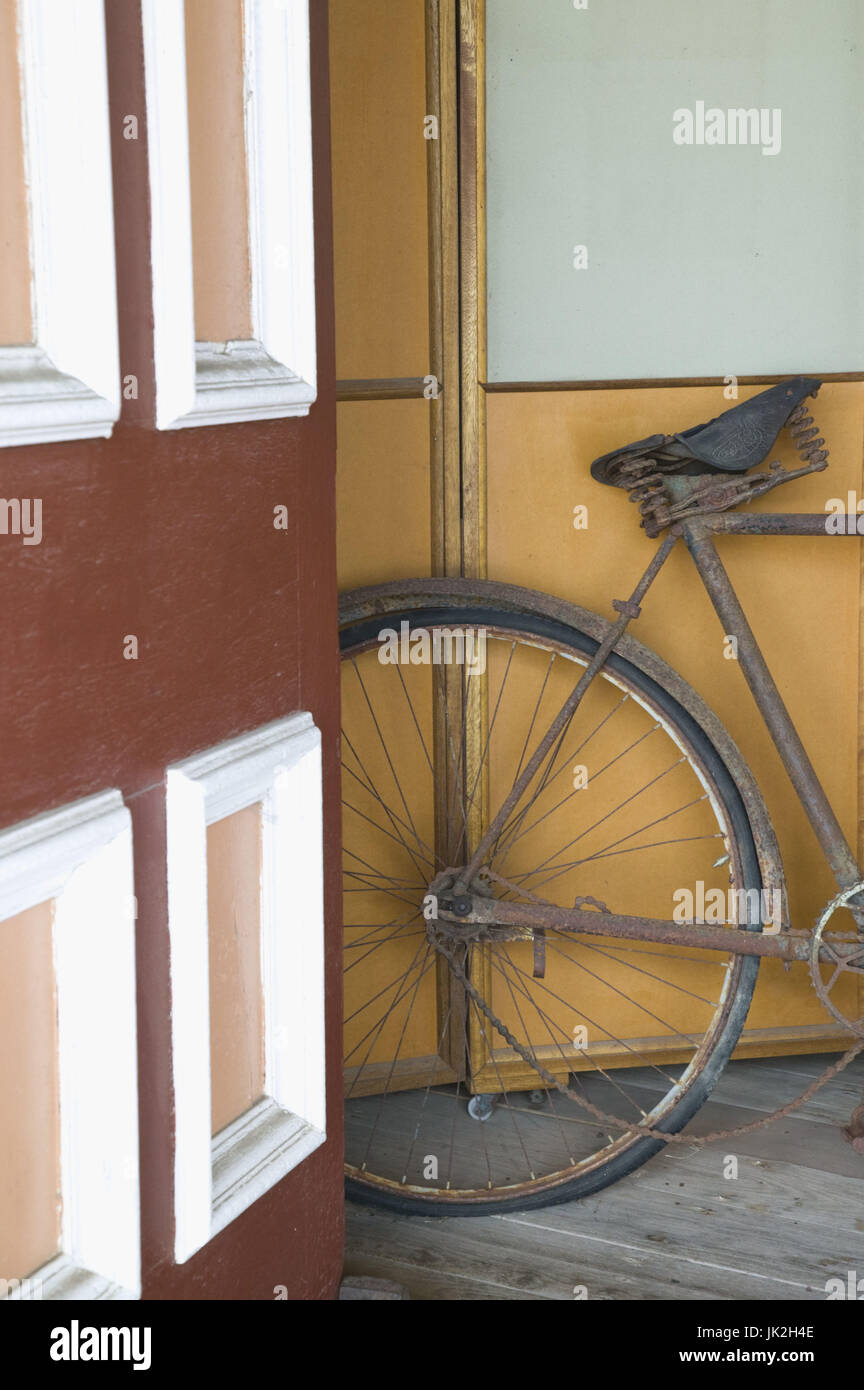 Australia, Queensland, Fraser Coast, Maryborough, Brennan & Geraghty's Store Museum-Old Bicycle by front entrance, Stock Photo