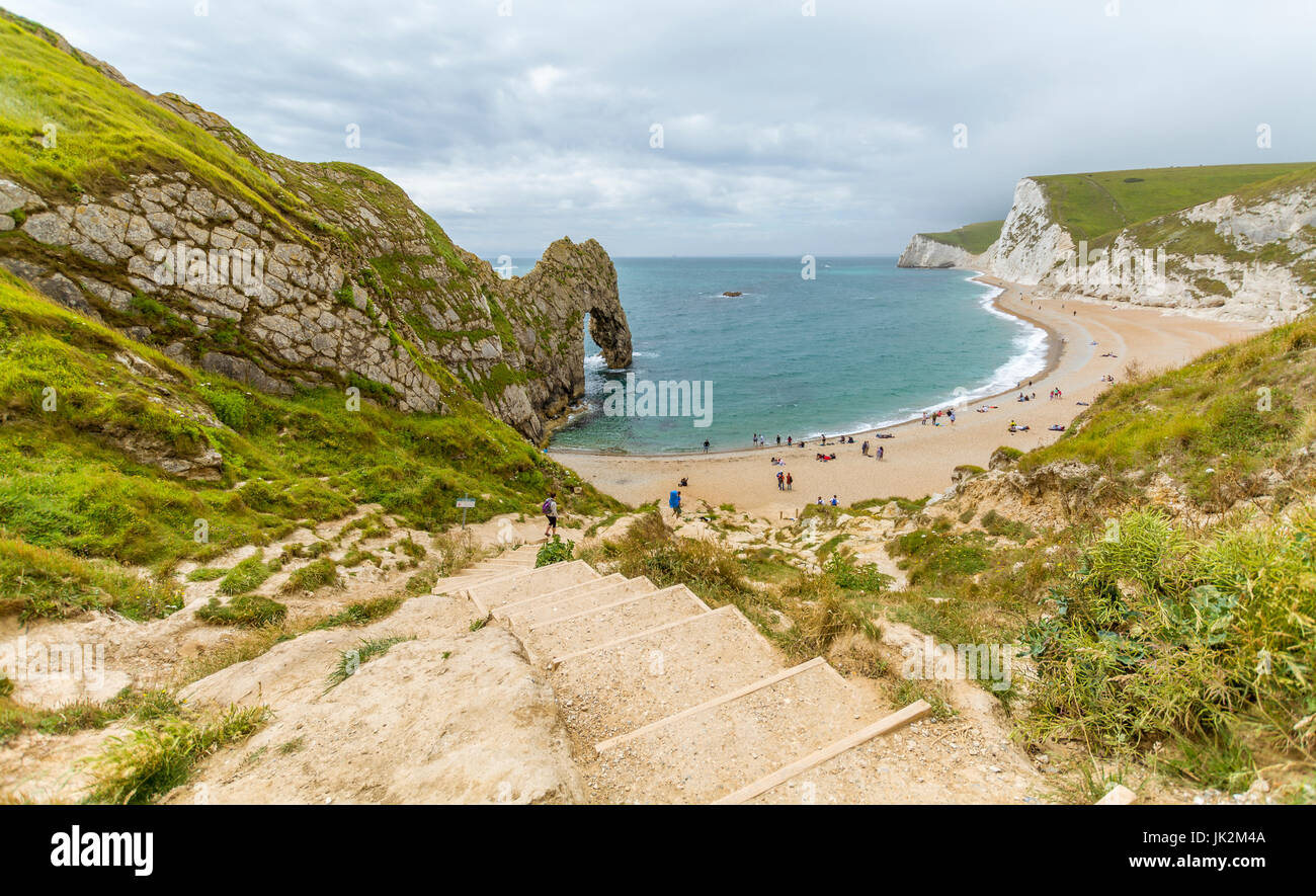 A view down the steps to Durdle Door at West Lulworth in Dorset Stock Photo