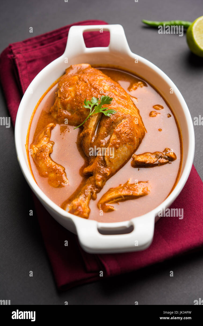 Indian spicy Chicken curry or masala chicken with prominent leg piece