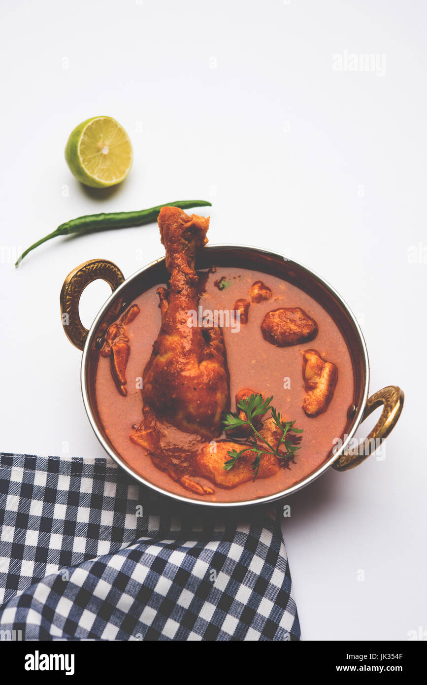 Indian spicy Chicken curry or masala chicken with prominent leg piece